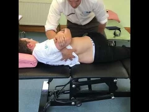 Massive back crack / lower back adjustment using an Osteopathic manipulation technique